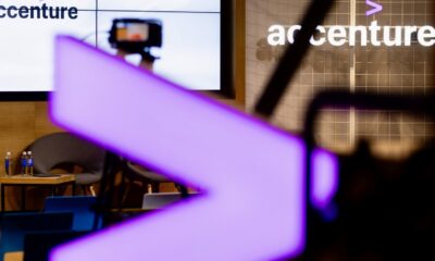 A photo at an Accenture office with the logo in prominent feature.
