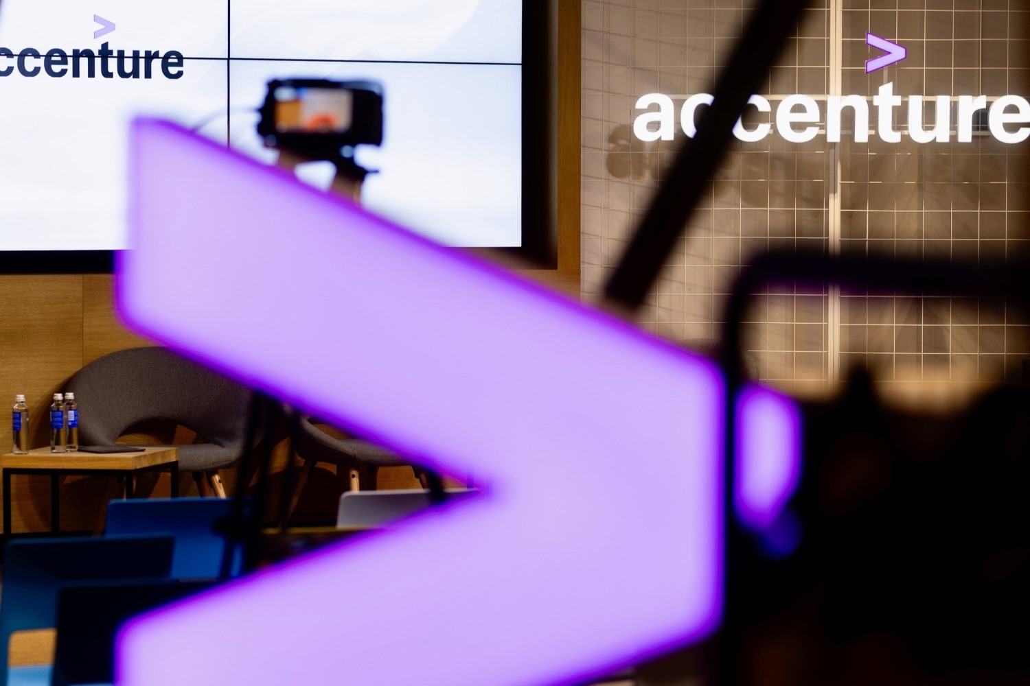 A photo at an Accenture office with the logo in prominent feature.