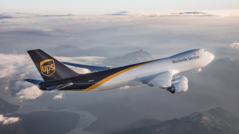 A UPS 747 flies above the mountain. Image credit: UPS